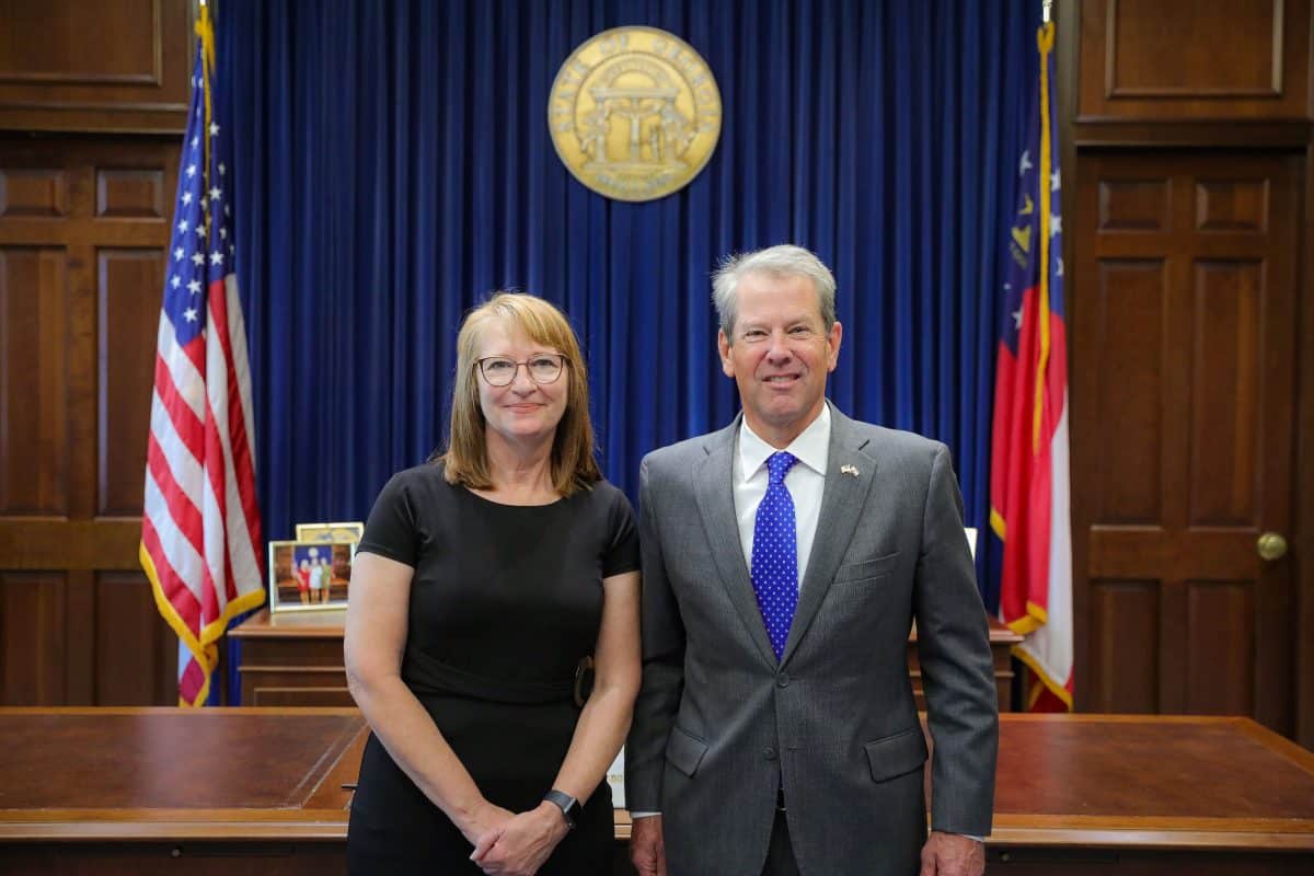 Joyce Freeman poses for photo with Governor Brian Kemp after being sworn in as a member of the Georgia Board of Early Care and Learning